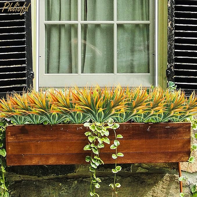 16Pcs Artificial Grass Fake Plants 17.3in Outdoor Plastic Plants UV Resistant Greenery Fake Grass for Home Window Garden Office Patio Hanging Planter Pathway Front Porch Décor Orange Yellow